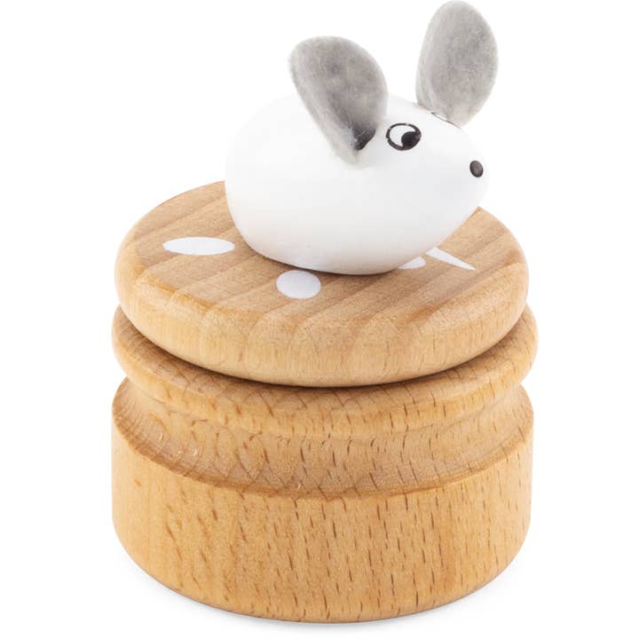 Weisse Zahndose aus Holz mit Mäusemotiv.