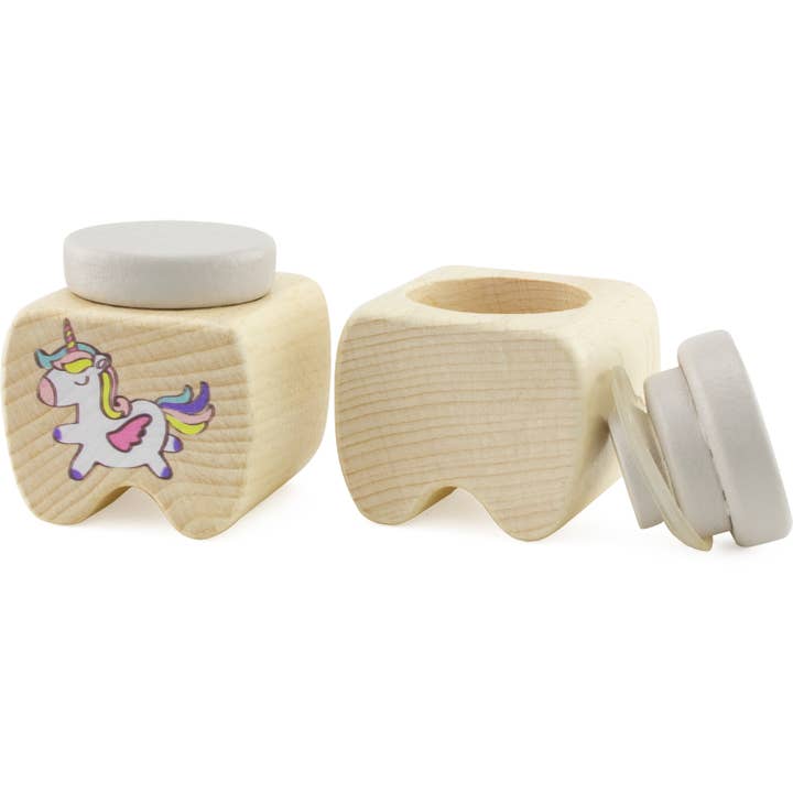 Zahndose aus Holz mit Einhorn-Design. Zahndose aus Holz mit Einhorn-Design.